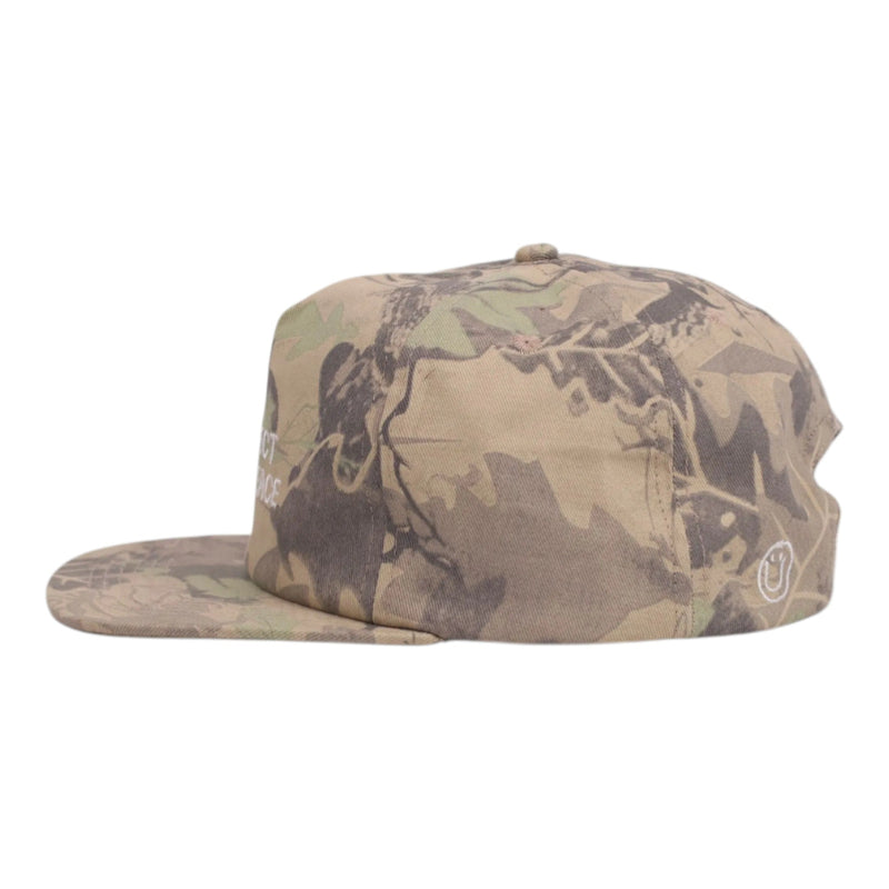 Camouflage-patterned cap on a white background