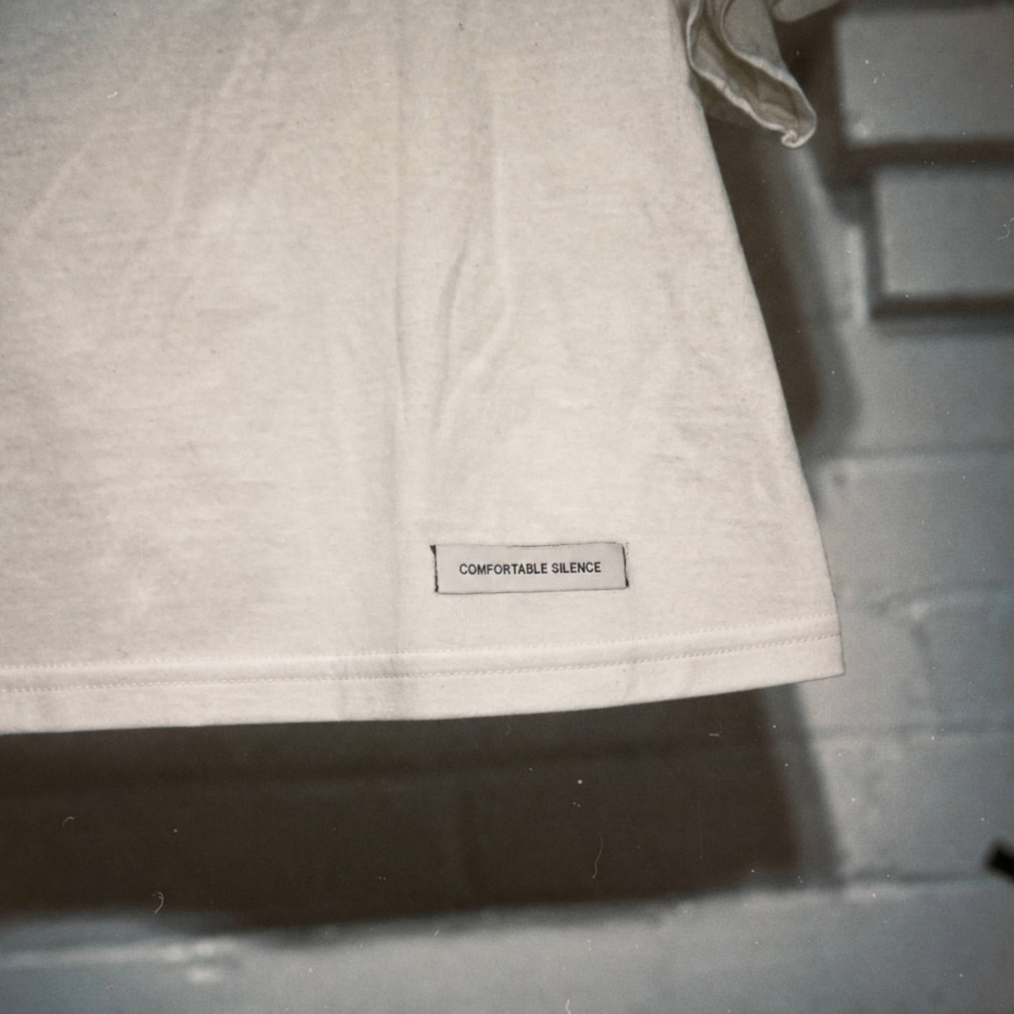 FCK ’EM White Hand-Stenciled Short Sleeve Tee
