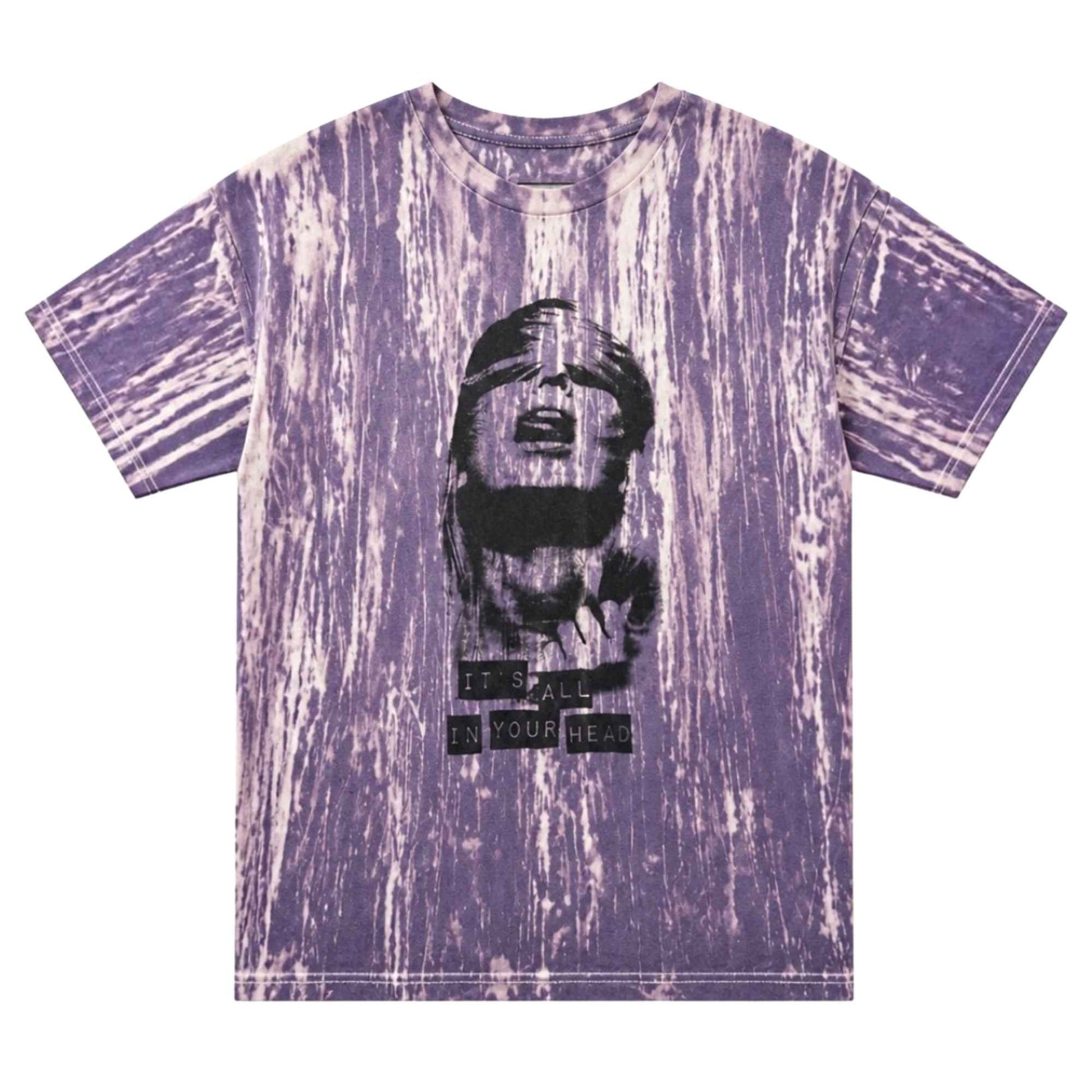A purple and white tie-dye t-shirt with a black graphic print of a face on the front, set against a plain white background.