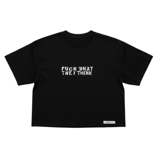 A black short-sleeve crop top t-shirt with the phrase 'FUCK WHAT THEY THINK' printed in a stylized white font across the chest, displayed flat against a solid white background.