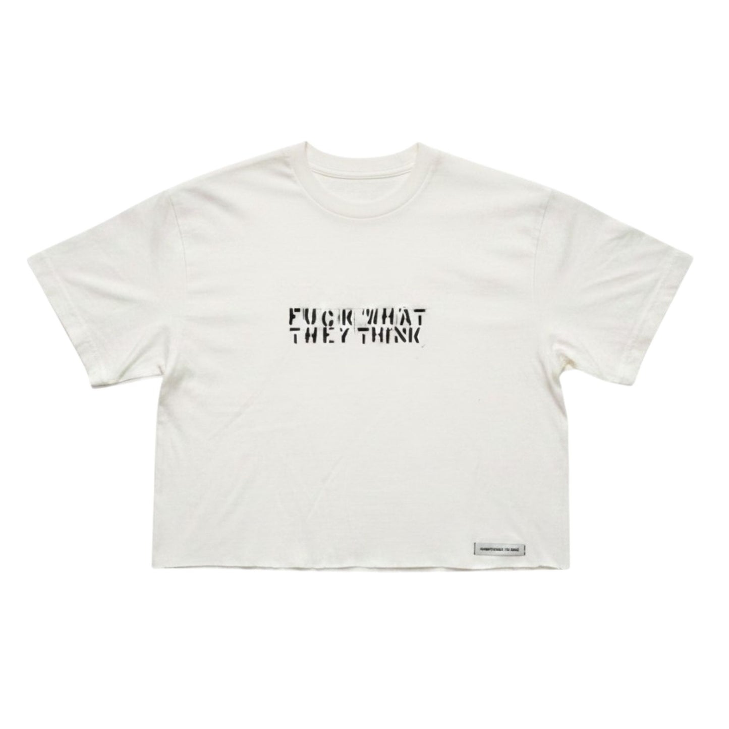 An off-white cropped t-shirt with the text 'FUCK WHAT THEY THINK' printed in black across the chest, displayed flat against a white background.