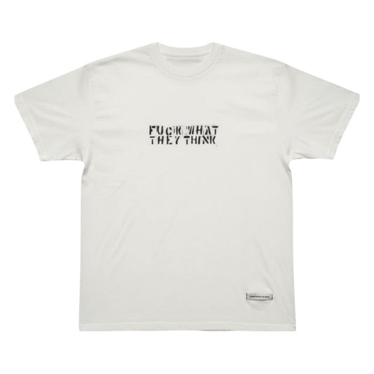 An off-white short-sleeve t-shirt with the text 'FUCK WHAT THEY THINK' printed in black stencil font on the chest, displayed flat against a white background.