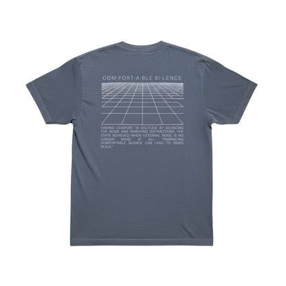 Back view of the faded indigo t-shirt featuring a large white perspective grid graphic and a paragraph about finding comfort in solitude, on a white background.